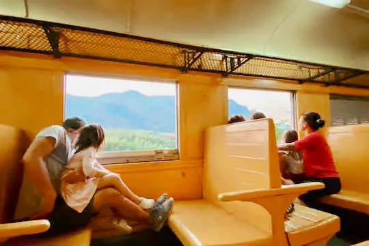 Riding the train in Thailand